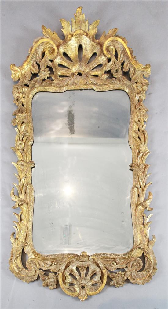 A George II carved giltwood wall mirror, H.4ft 6in. W.2ft 4in.